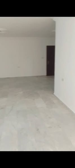 شقة أرضية فاخرة للبيع في ضاحية الرشيد