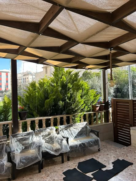 شقة فاخرة للبيع طابق أرضي مع ترس في ضاحية الرشيد - 2
