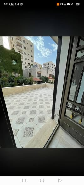 شقة أرضية للبيع مع تيراس وكراج في ضاحية الرشيد - 3