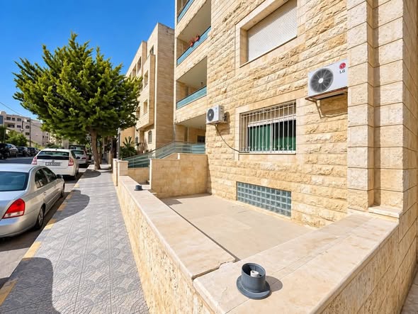 شقة أرضية مميزة في تلاع العلي بمساحة 205م - 2