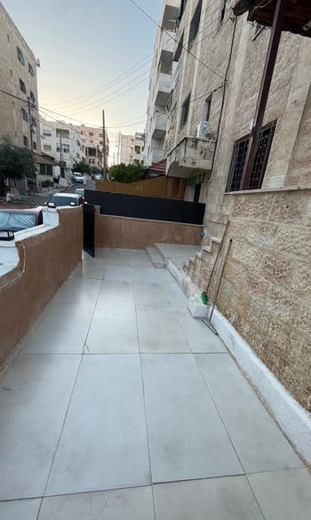 شقة طابق أرضي بحديقة خاصة في حي نزال - 5
